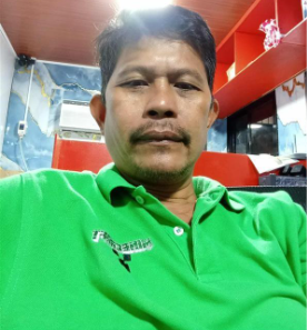 A person in a green shirt

AI-generated content may be incorrect.